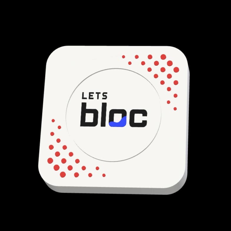 A white bloc with red dots